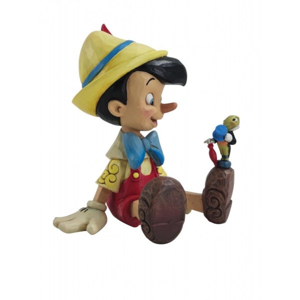 PINOCHO Y PEPITO SENTADOS
