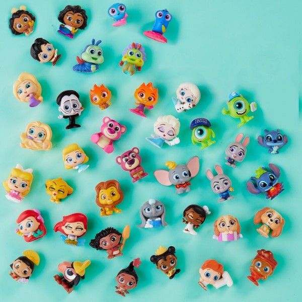 Cápsula Camara sorpresa figura Peek Serie 13 Disney Doorables